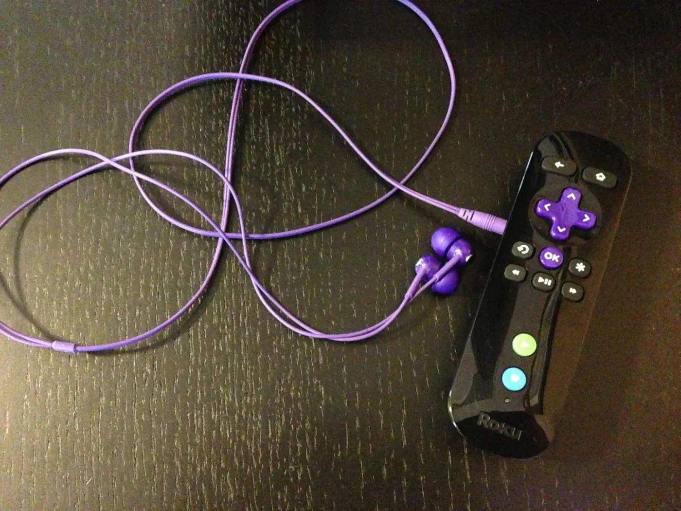 The nifty remote with wireless earbuds.&nbsp;
